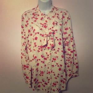 Ruffle front cream and red blouse